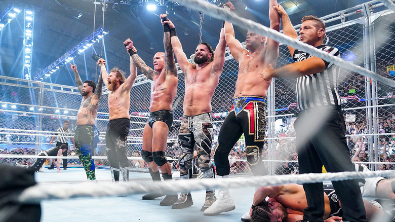 Jey Uso, Sami Zayn, Randy Orton, Seth Rollins, and Cody Rhodes raising their arms