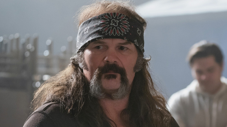 Chris Bauer as Wild Bill Hancock on Heels