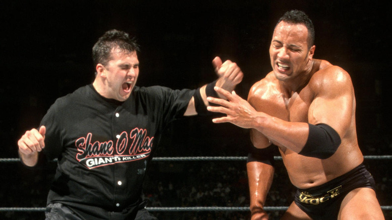 Shane McMahon punching The Rock