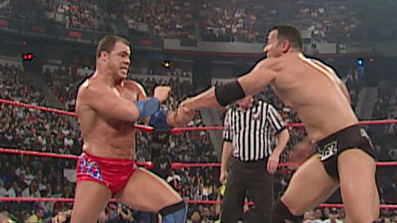 The Rock and Kurt Angle wrestling