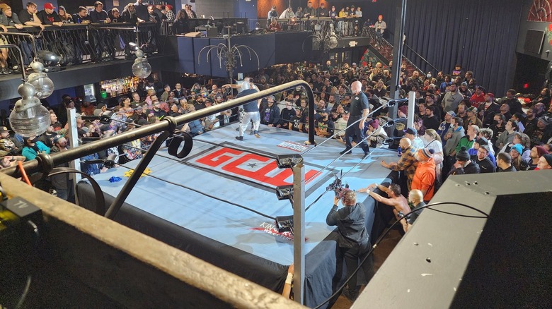 GCW ring with crowd around it
