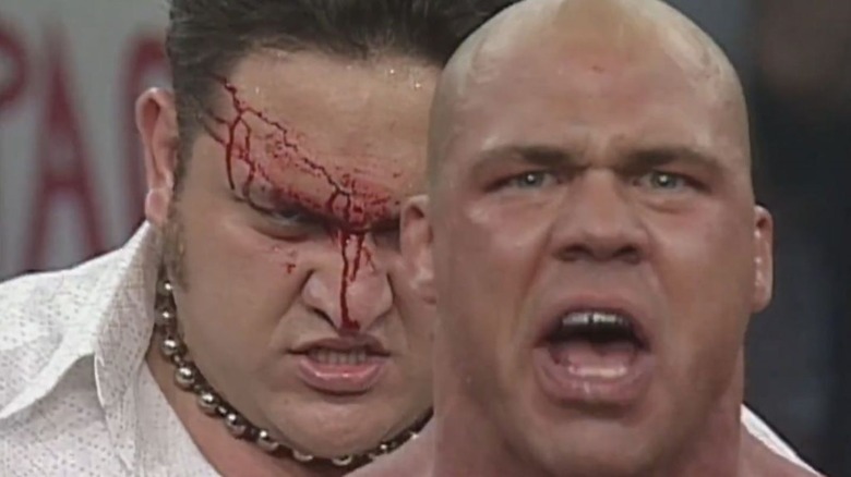 Samoa Joe bloodied behind Kurt Angle