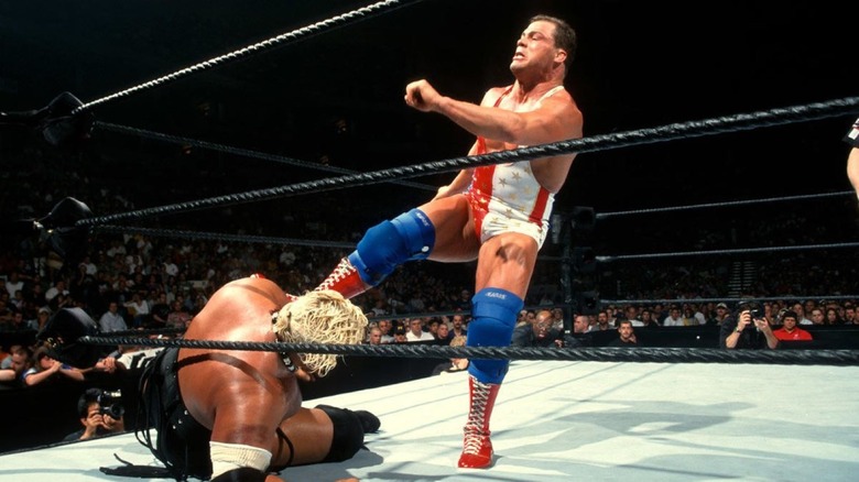 Kurt Angle kicks Rikishi