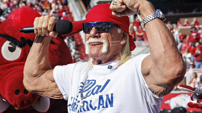 Hulk Hogan presents himself in the Real American Beer shirt