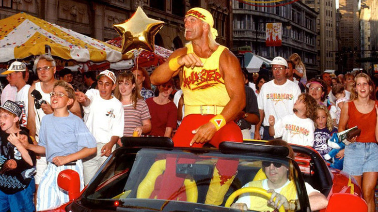 Hulk Hogan In A Car Surrounded By Fans 