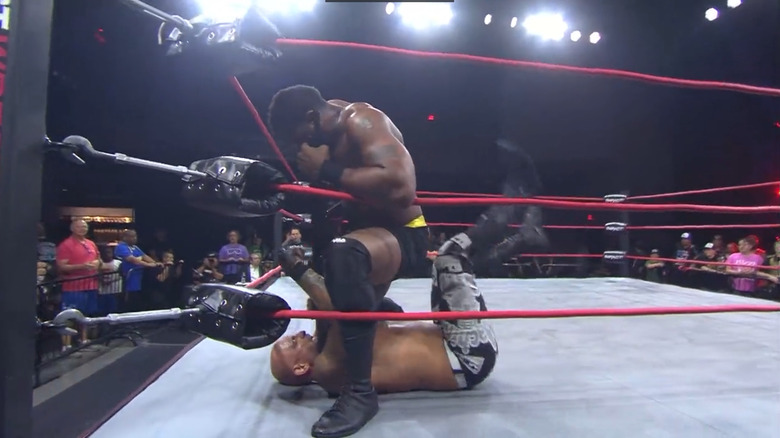 King attacking Anderson with a chair