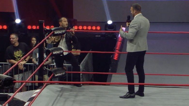 Nick Aldis addresses Alex Shelley