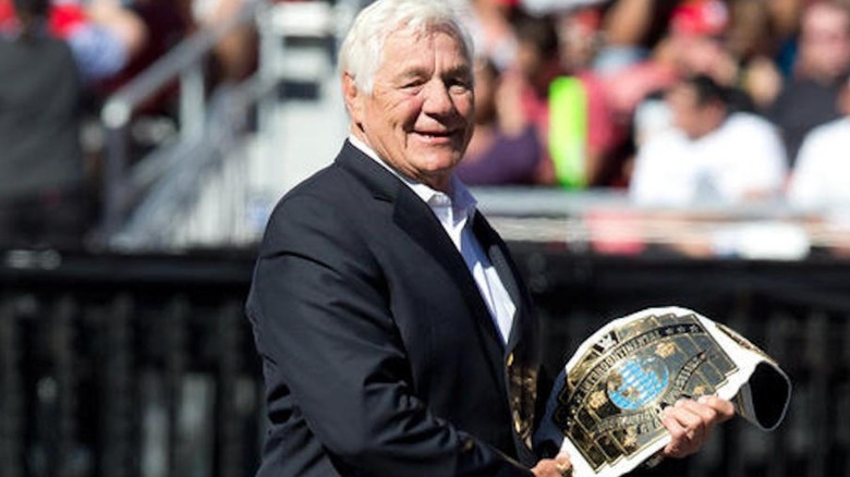 Pat Patterson carrying the Intercontinental Championship