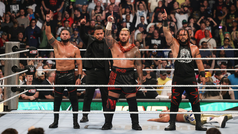 The Bloodline celebrate their win during Money in the Bank at Scotiabank Arena on July 6, 2024 in Toronto, Ontario.