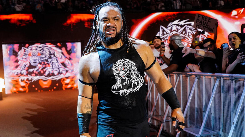 Jacob Fatu snarls as he makes his entrance.