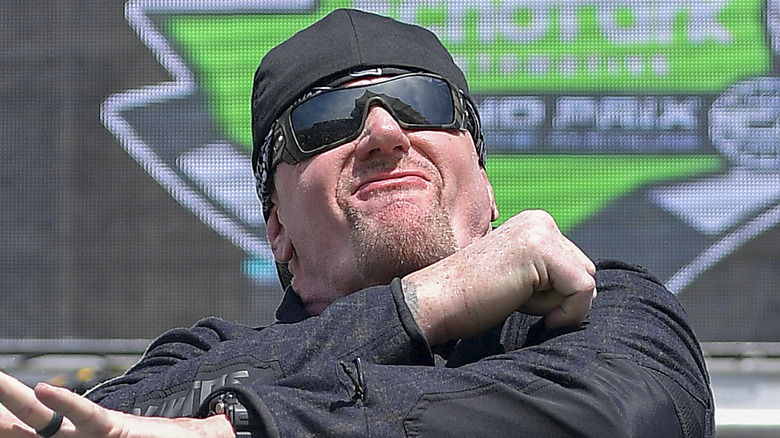 Undertaker poses