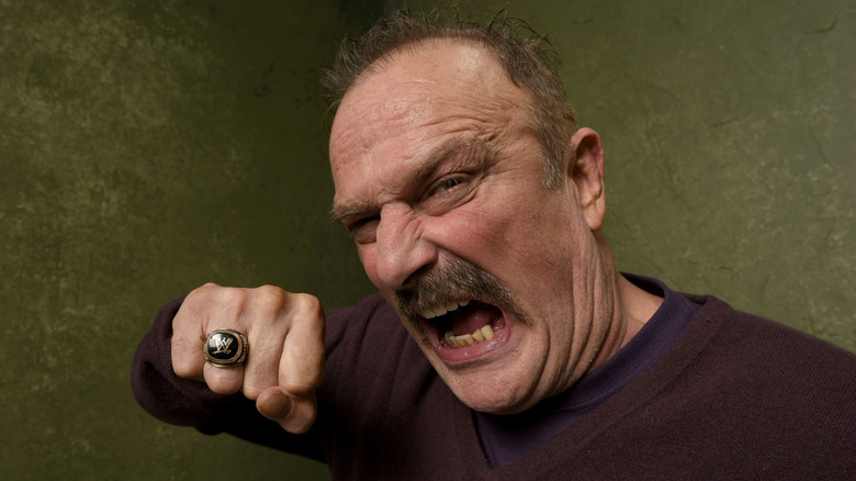 Jake Roberts posing