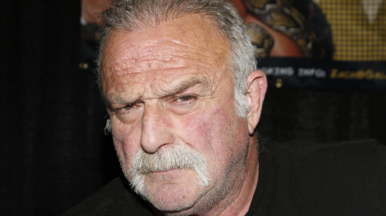 Professional wrestler Jake "The Snake" Roberts attends Unicon 2021 at the World Market Center on October 03, 2021 in Las Vegas, Nevada