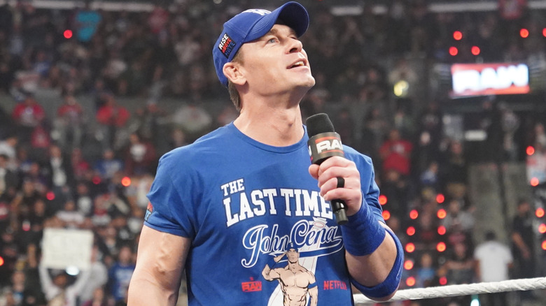 John Cena holding a microphone