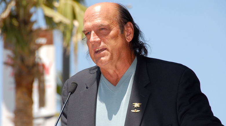 Jesse Ventura at a microphone