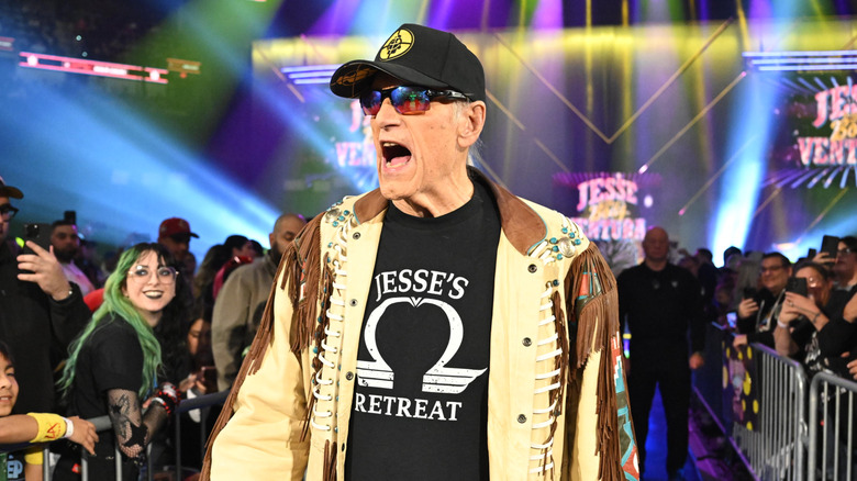 Jesse Ventura greets the fan's before giving joining the commentary table at 