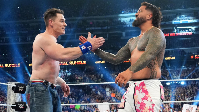 John Cena and Jey Uso shaking hands