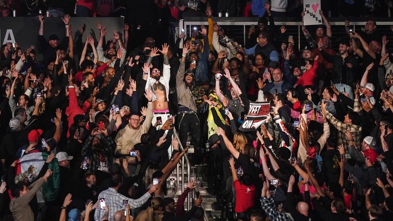 Jey Uso enters alongside Quavo during "WWE Raw"