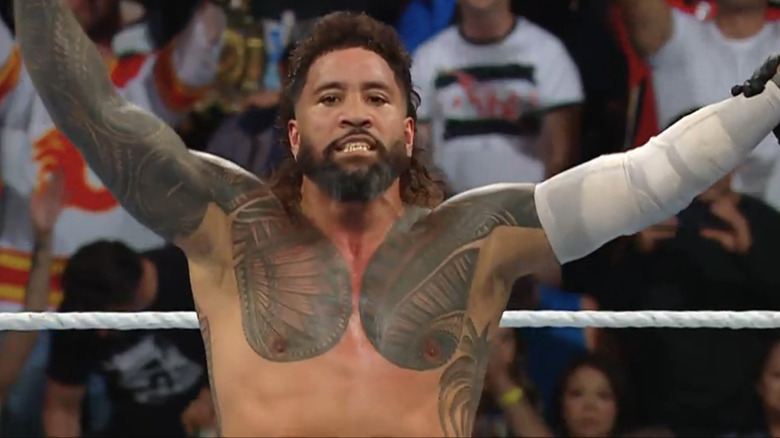 Jey Uso celebrates