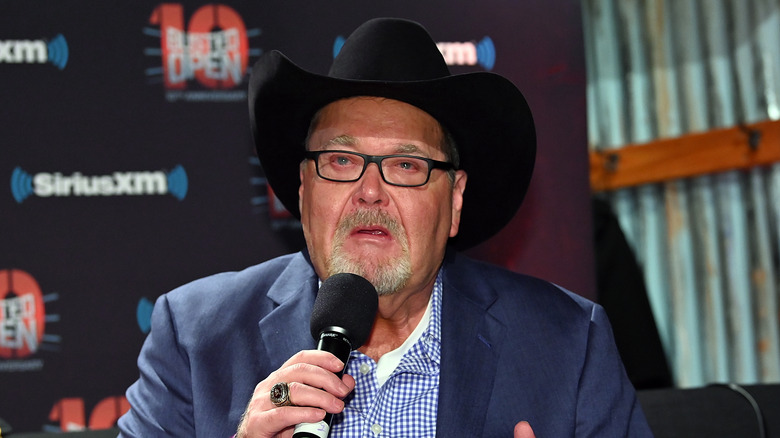 Jim Ross gives his thoughts on something to the "Busted Open" crew