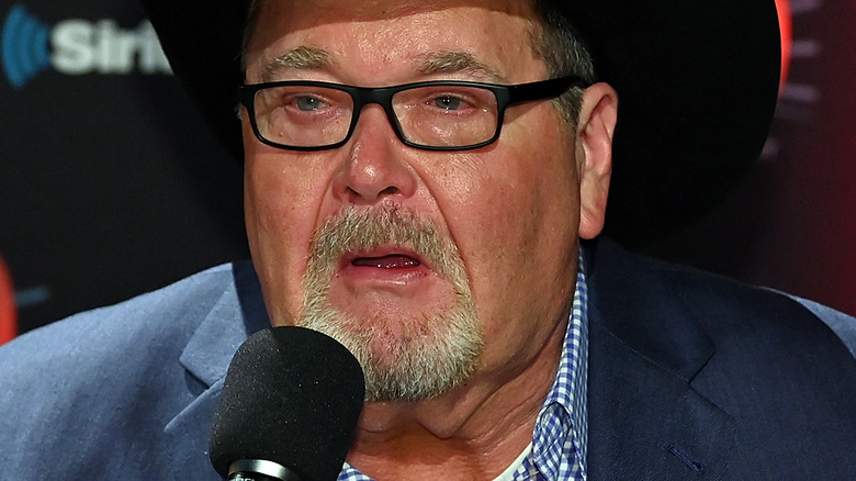 Jim Ross talking on the mic 