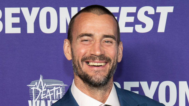 CM Punk smiles