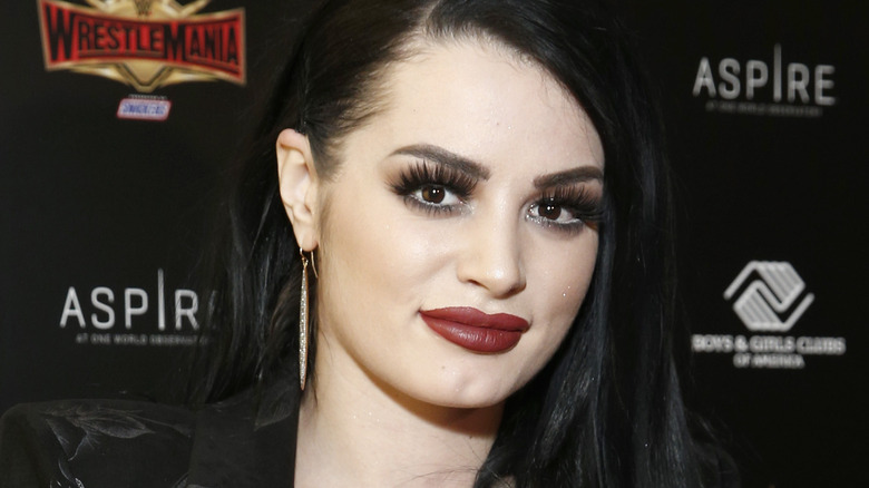 Paige smiles