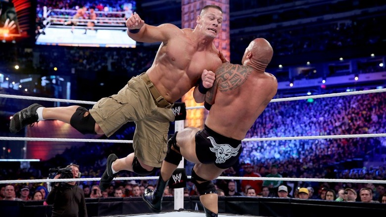 John Cena wrestling The Rock
