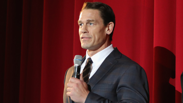 John Cena onstage with a Microphone