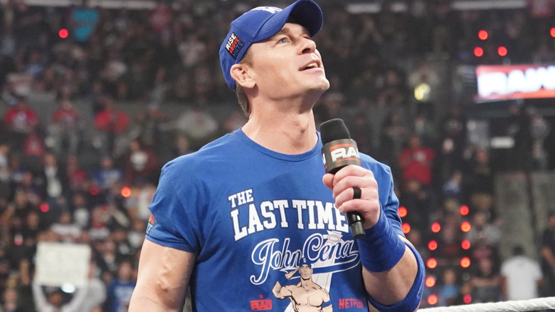 John Cena holding a microphone