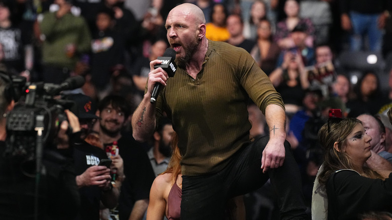 Jon Moxley cuts a promo from the front row of the crowd during an episode of "AEW Collision."