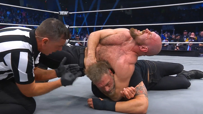 Jon Moxley chokes out Cope