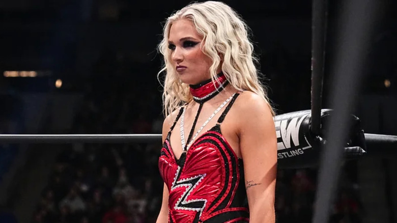 Julia Hart wearing red ring gear