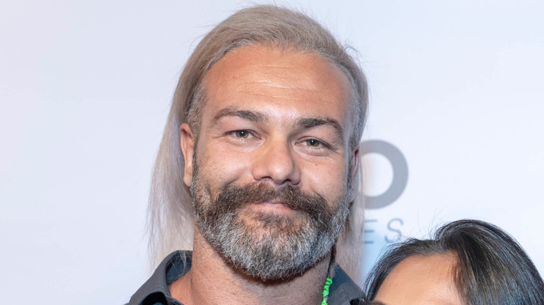 Justin Gabriel poses on the red carpet