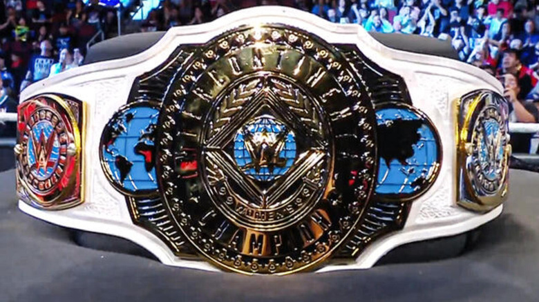 The Women's Intercontinental Championship title sits on a black plush display.