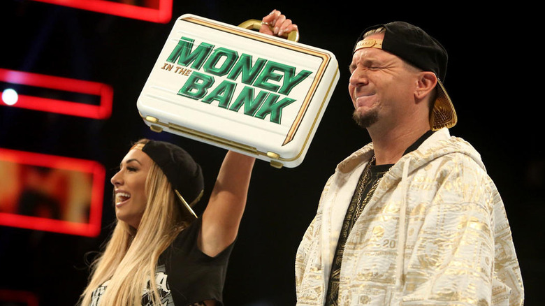 James Ellsworth appearing with 2017 women's Money in the Bank winner Carmella