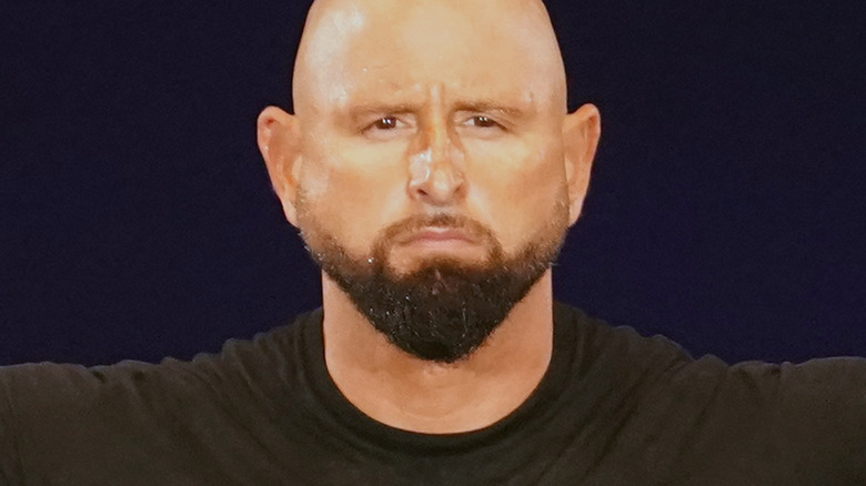 Karl Anderson serious face stare crowd