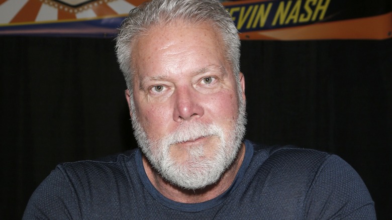 Kevin Nash poses at autograph signing