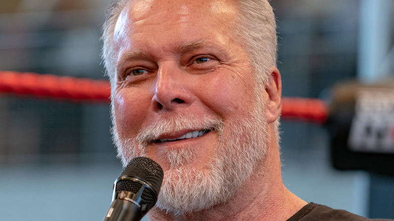 Kevin Nash smiling with microphone