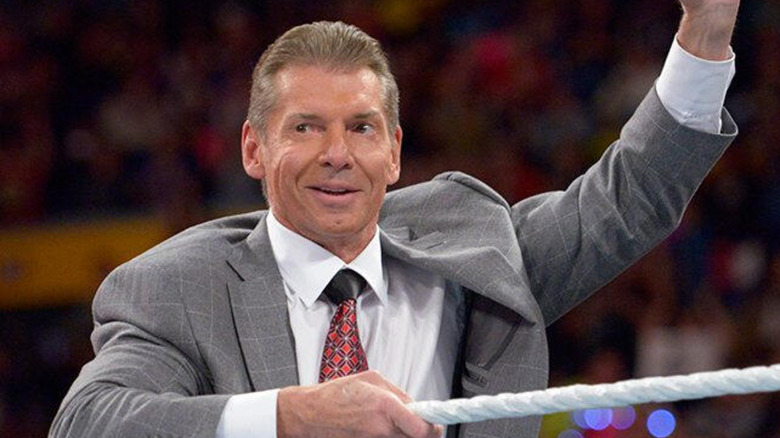 Vince McMahon raising his fist up