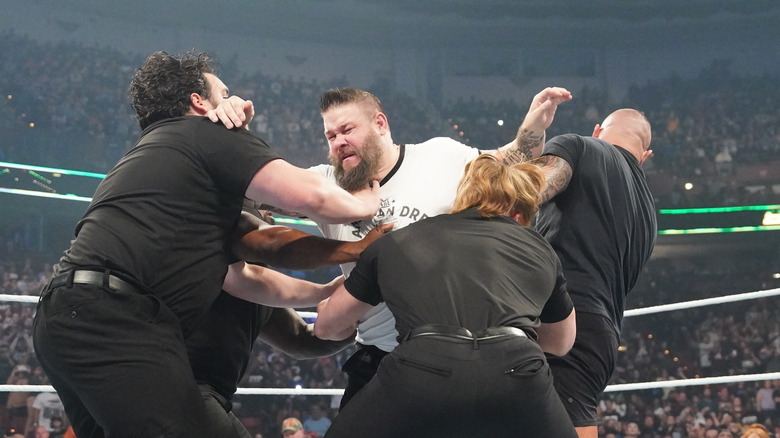 Kevin Owens tries to attack Cody Rhodes during Smackdown at Bon Secours Wellness Arena on October 11, 2024 in Greenville, South Carolina