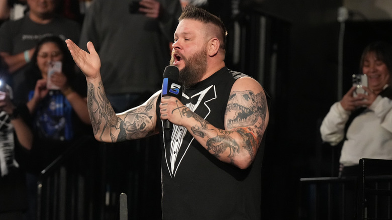 Kevin Owens on the microphone during WWE SmackDown at Delta Center on November 22, 2024 in Salt Lake City, Utah.