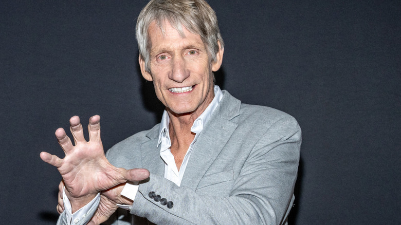 Kevin Von Erich doing his iconic Iron Claw pose during the Los Angeles premiere of 