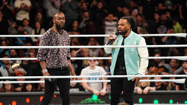 Kofi Kingston and Xavier Woods cutting a promo