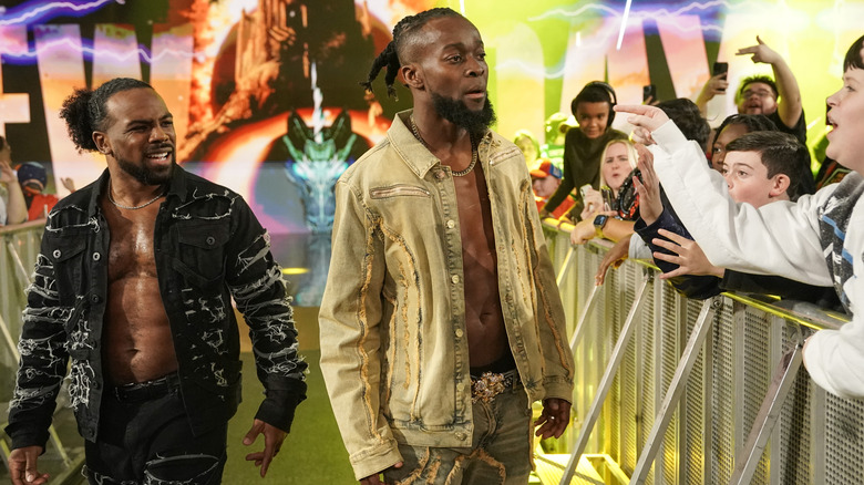 Kofi Kingston and Xavier Woods making their entrance