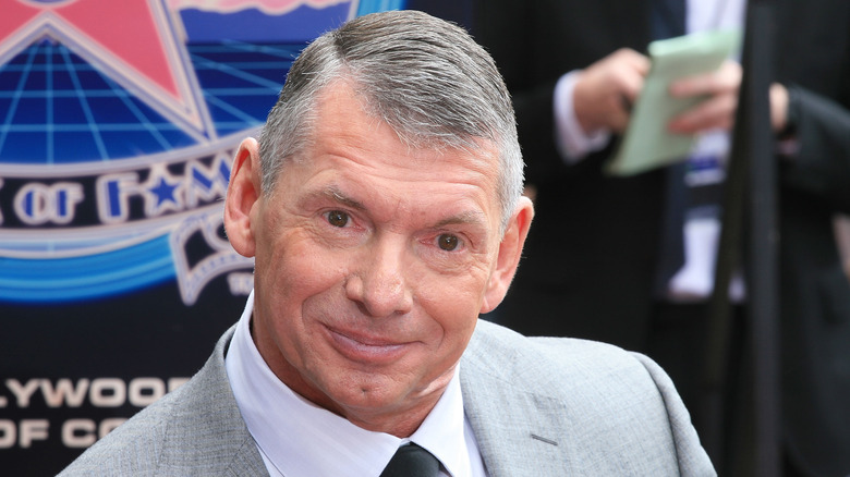 Vince McMahon smiles