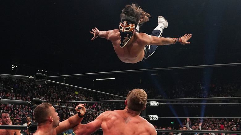 Bandido dives over the top rope