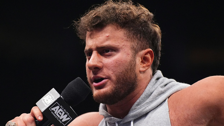 MJF speaking on the microphone in AEW