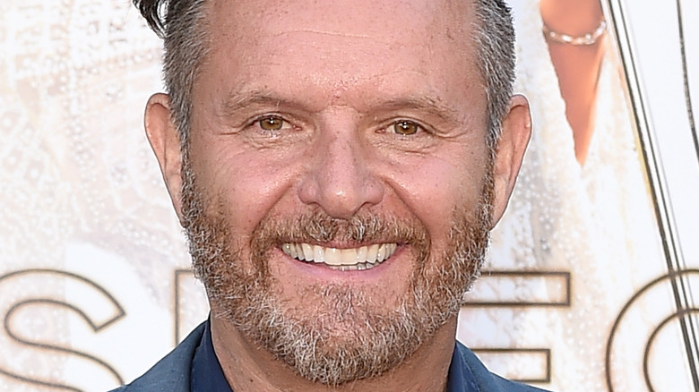 Mark Burnett smiles