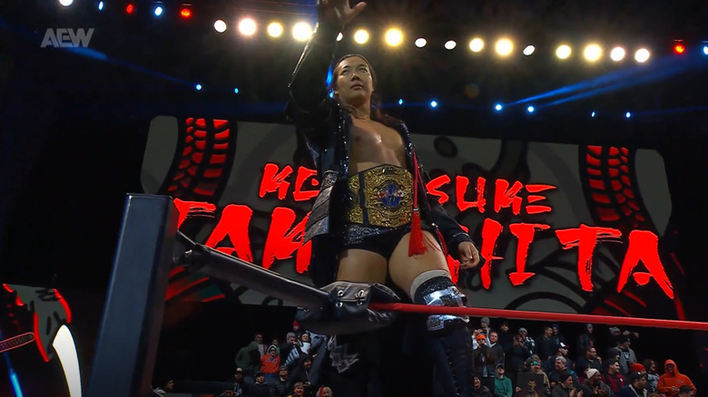 Reigning AEW International Champion Konosuke Takeshita enters during 